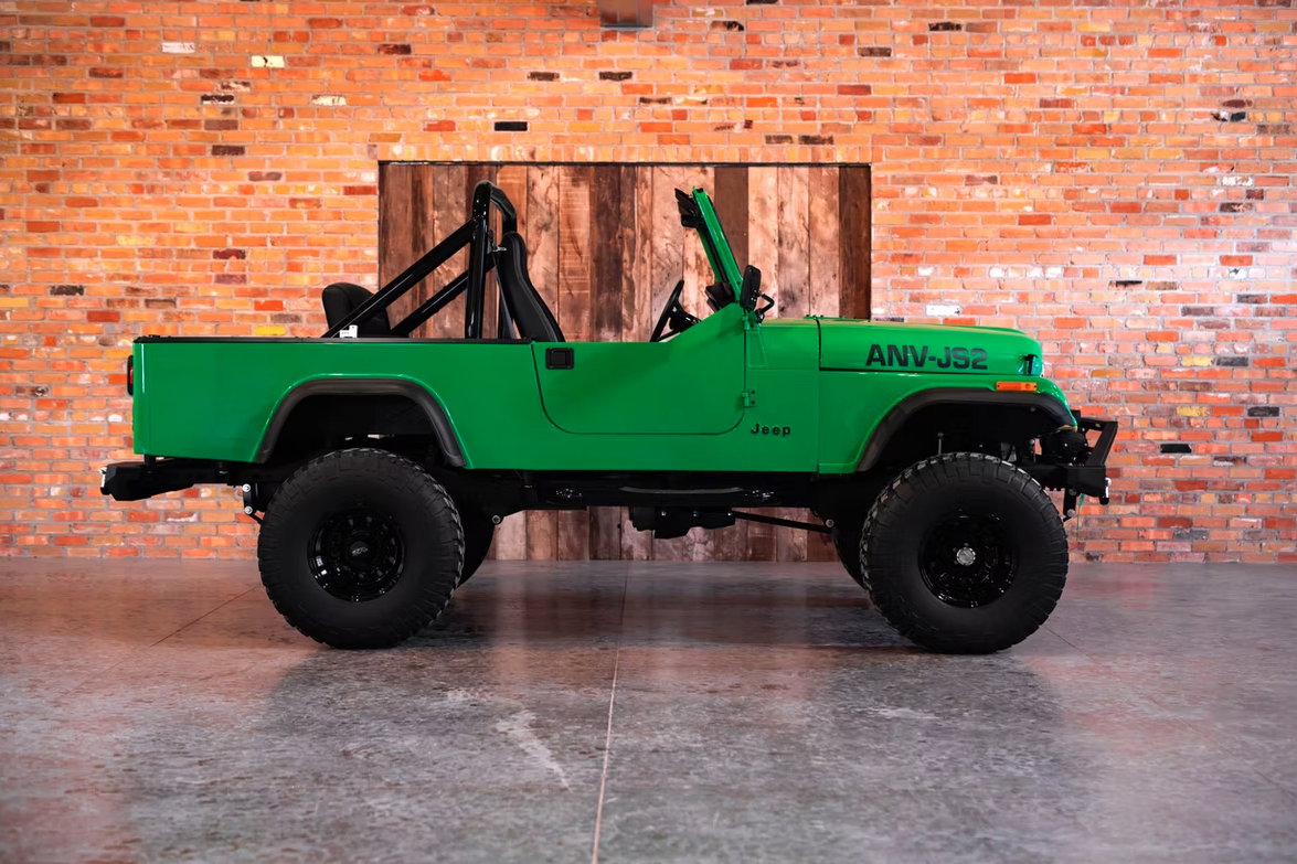 Jeep CJ-8 Scrambler Restomod by Blacksmith Garage: Python Green, Full Leather, Auction Oct 25 3 Jeep CJ-8 Scrambler ANV-JS2 Blacksmith Garage side roof off