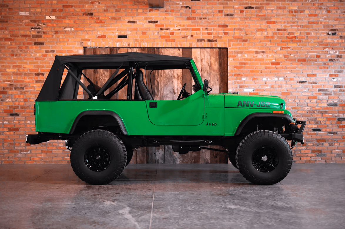 Jeep CJ-8 Scrambler Restomod by Blacksmith Garage: Python Green, Full Leather, Auction Oct 25 7 Jeep CJ-8 Scrambler ANV-JS2 Blacksmith Garage side roof on