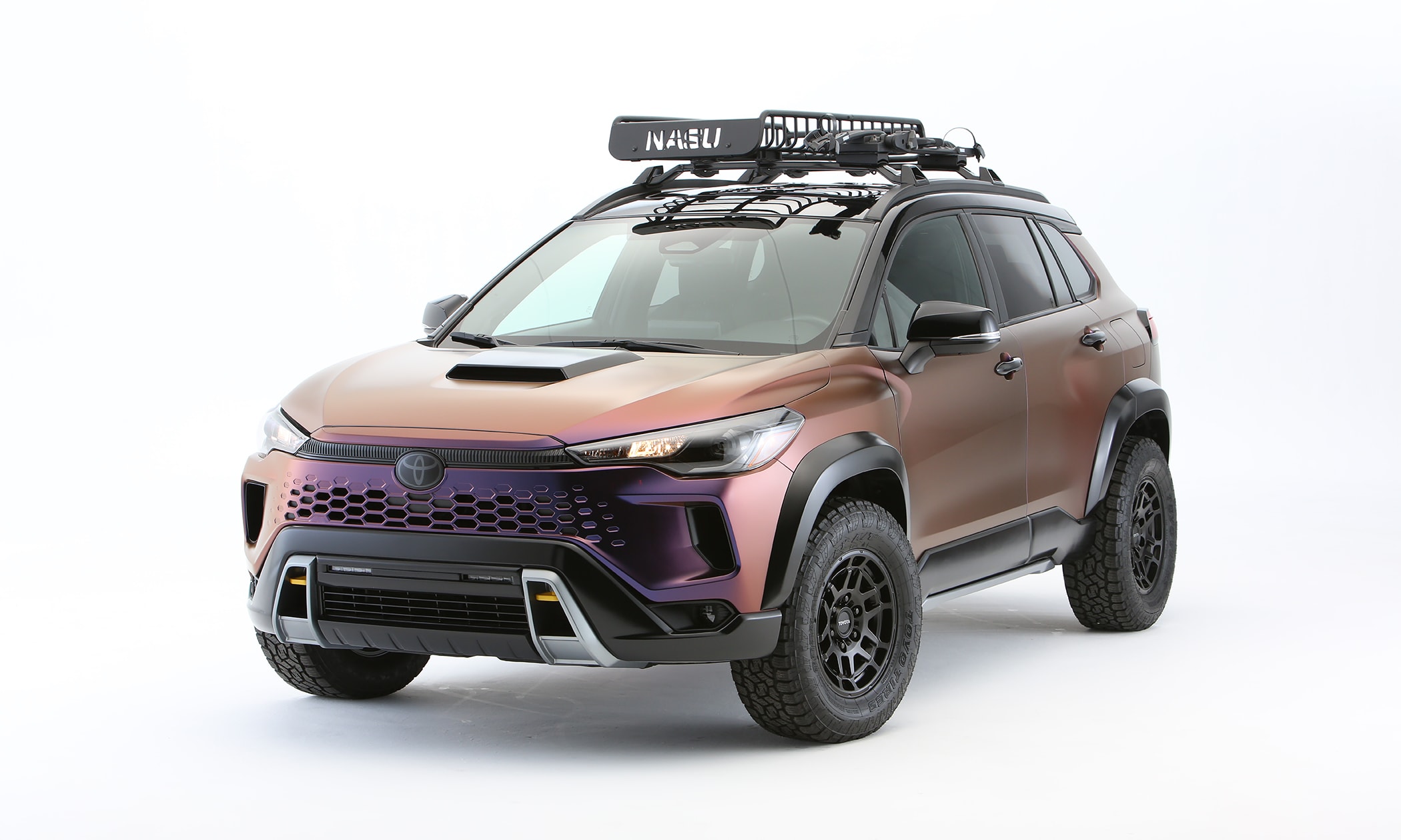 Toyota Explores The Wild Side Of All Its Powertrains At SEMA: Hydrogen Tacoma, EV Race Car, & V6 Land Cruiser Restomod 2 corolla cross nasu edition toyota sema 2025 hero