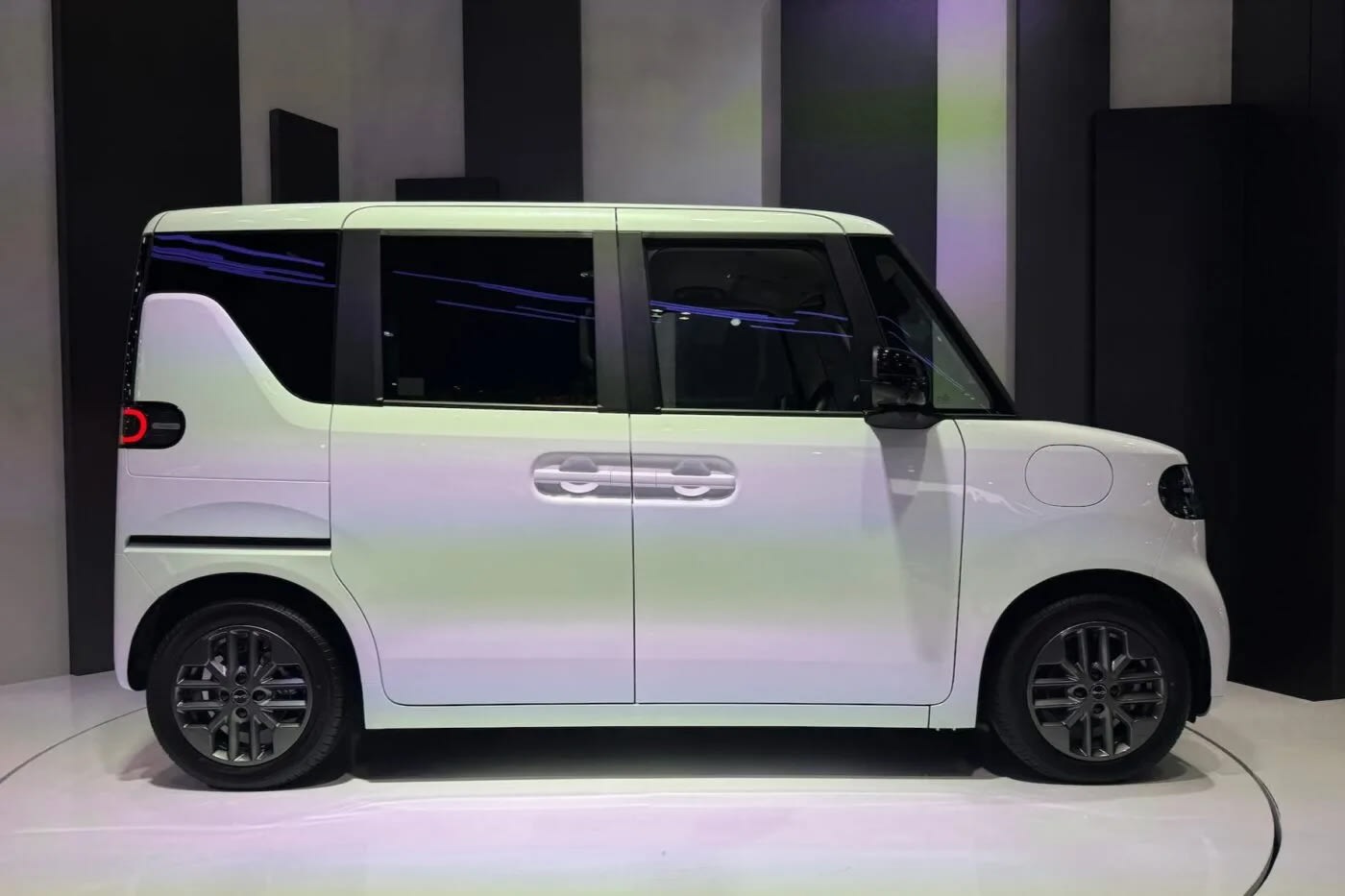 BYD Racco Electric Kei Car Exciting Debut in Japan: China Challenges Domestic Brands with $17,000 Micro EV 4 Side view of the BYD Racco electric kei car revealed at the Japan Mobility Show