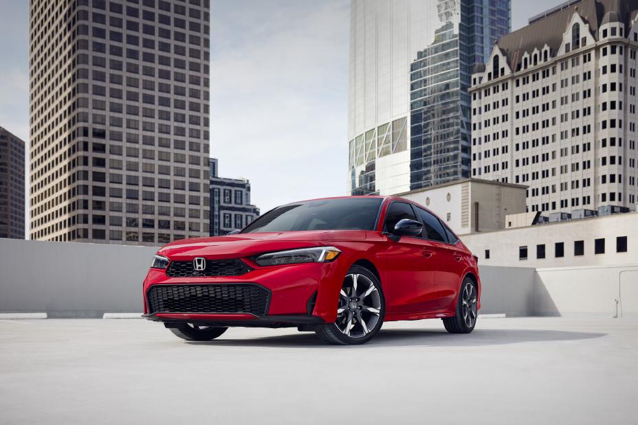 Honda Just Broke a Rule Every Carmaker Followed for Decades — This New Chassis Is a Game-Changer 3 front three quarter shot of a red 2026 Honda Civic