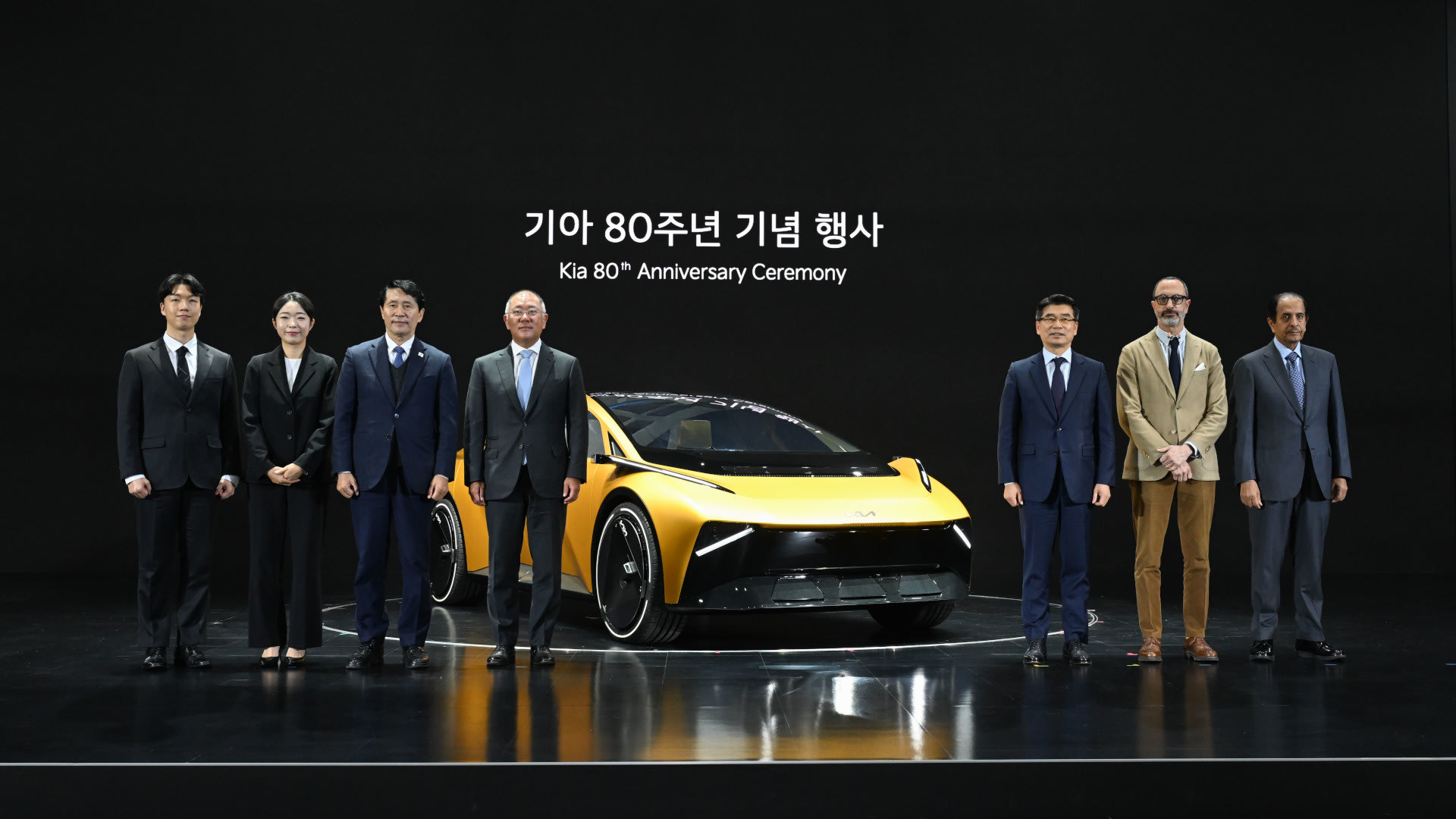 Kia Vision Meta Turismo concept Tech Includes AR HUD and Joystick Shift Lever 6 Kia executives alongside Vision Meta Turismo concept