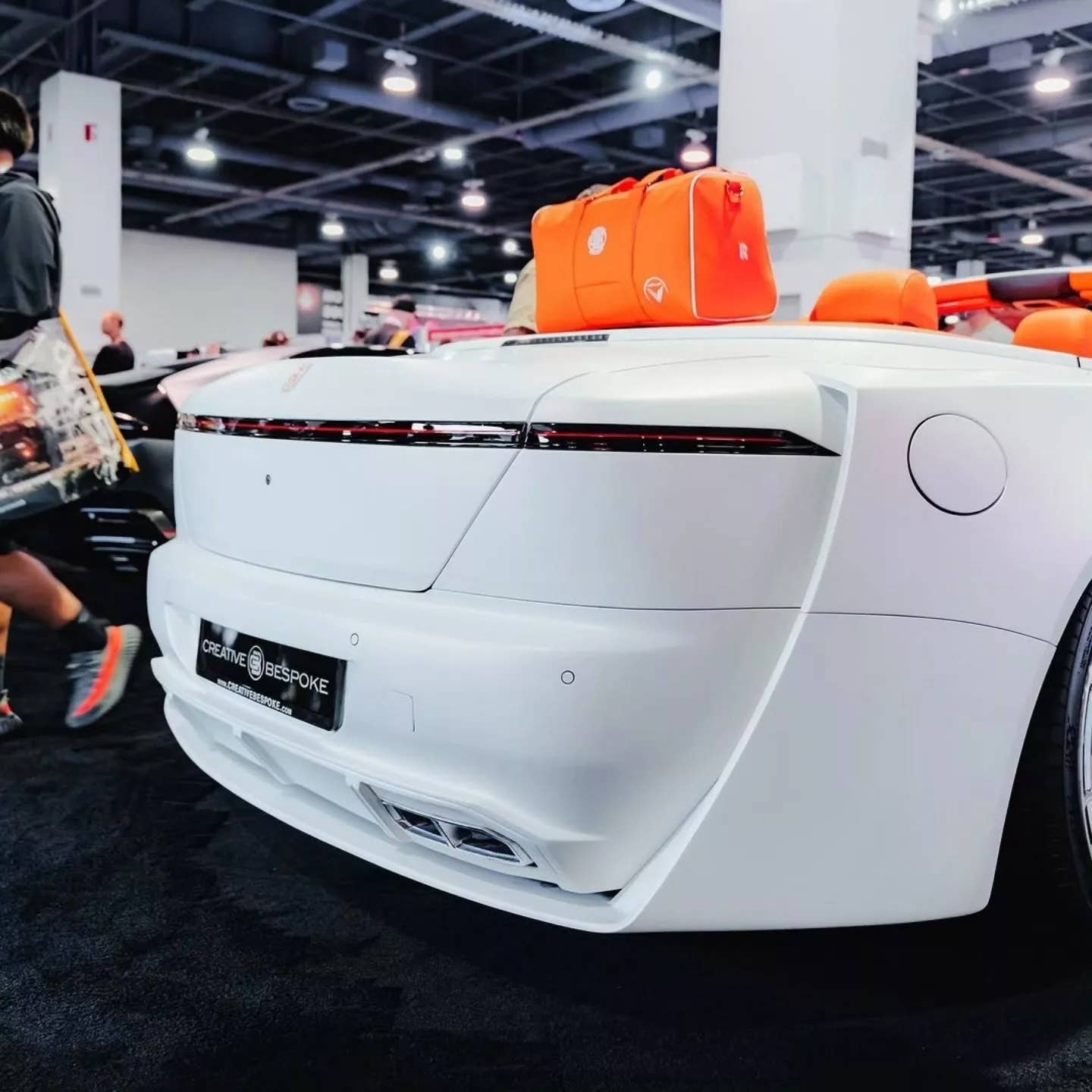 Rear of a white Rolls Royce Dawn with the limited edition Venuum widebody kit