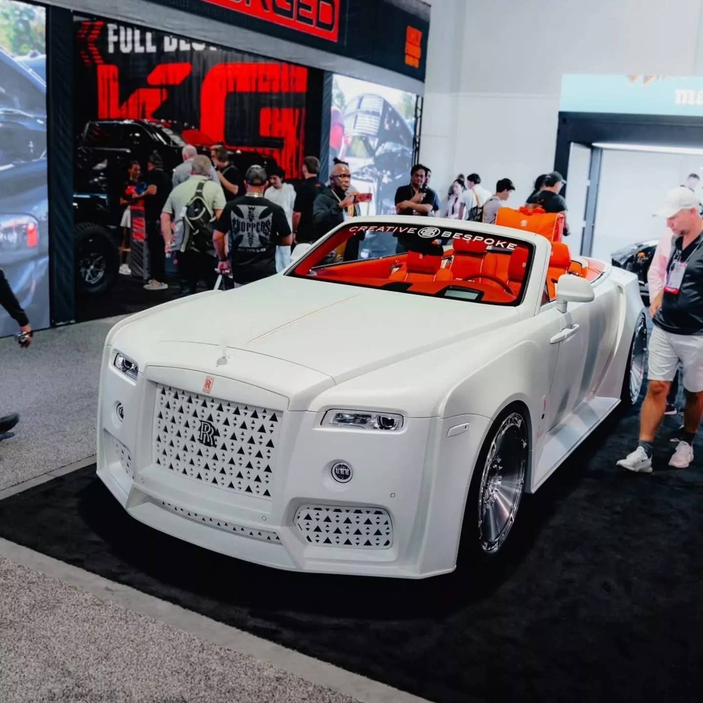 A white Rolls Royce Dawn with the limited edition Venuum widebody kit